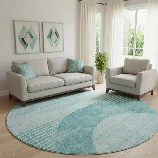 8' Teal And Ivory Geometric Washable Round Rug With UV Protection Photo 1