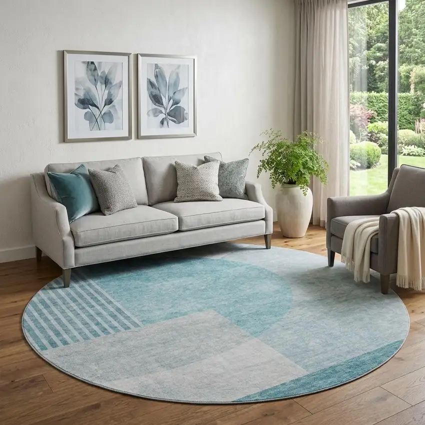 8' Teal And Ivory Geometric Washable Round Rug With UV Protection Photo 1