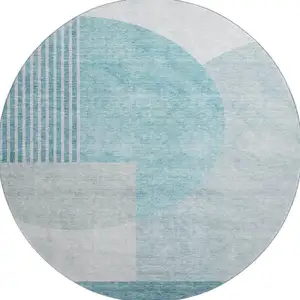 Photo of 8' Teal And Ivory Geometric Washable Round Rug With UV Protection