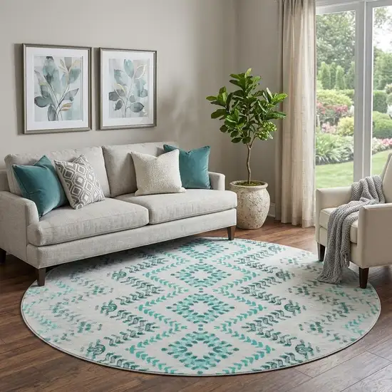 8' Teal And Ivory Geometric Washable Round Rug With UV Protection Photo 1