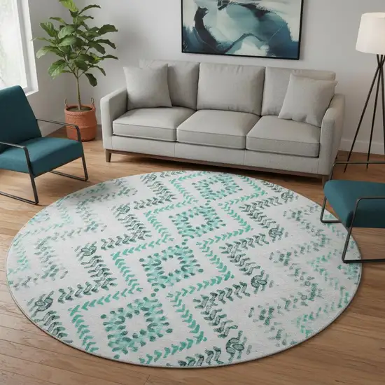 8' Teal And Ivory Geometric Washable Round Rug With UV Protection Photo 2