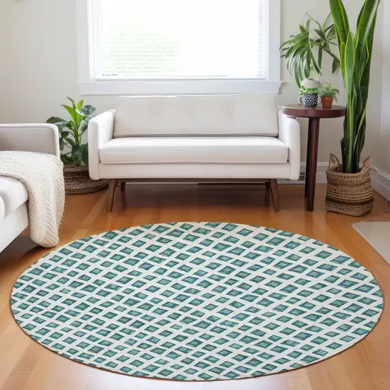 8' Teal And Ivory Geometric Washable Round Rug With UV Protection Photo 5