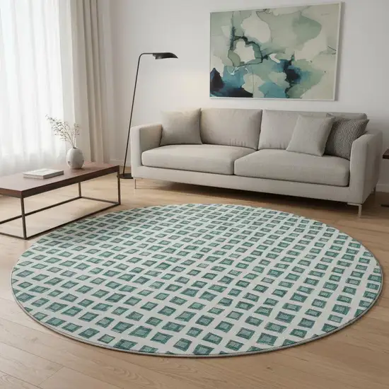 8' Teal And Ivory Geometric Washable Round Rug With UV Protection Photo 2