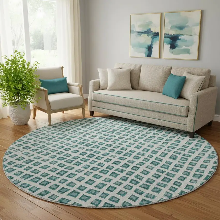 8' Teal And Ivory Geometric Washable Round Rug With UV Protection Photo 1