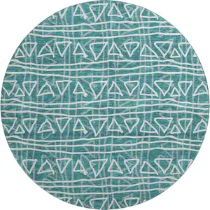 Photo of 8' Teal And Ivory Geometric Washable Round Rug With UV Protection