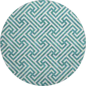 Photo of 8' Teal And Ivory Geometric Washable Round Rug With UV Protection