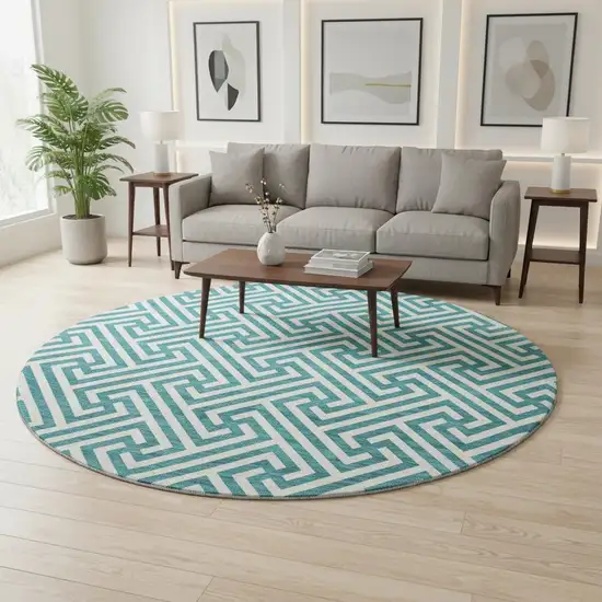 8' Teal And Ivory Geometric Washable Round Rug With UV Protection Photo 2