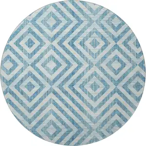 Photo of 8' Teal And Ivory Geometric Washable Round Rug With UV Protection