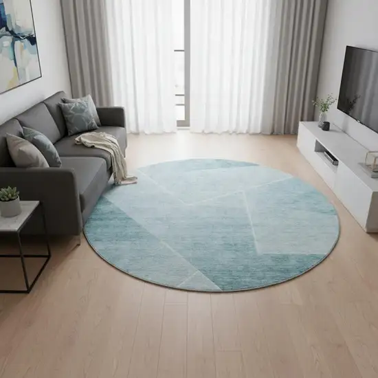 8' Teal And Ivory Geometric Washable Round Rug With UV Protection Photo 2