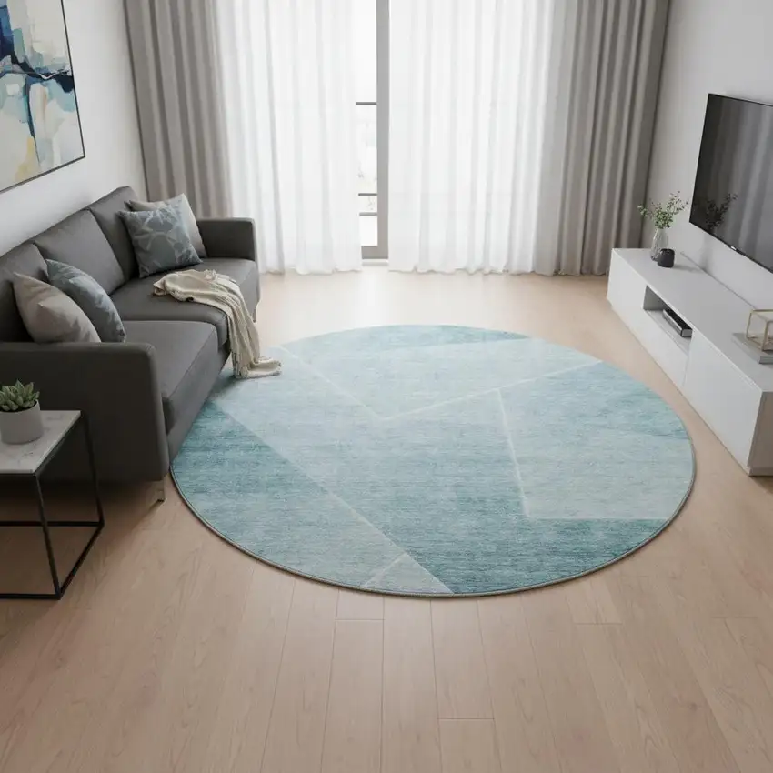 8' Teal And Ivory Geometric Washable Round Rug With UV Protection Photo 2