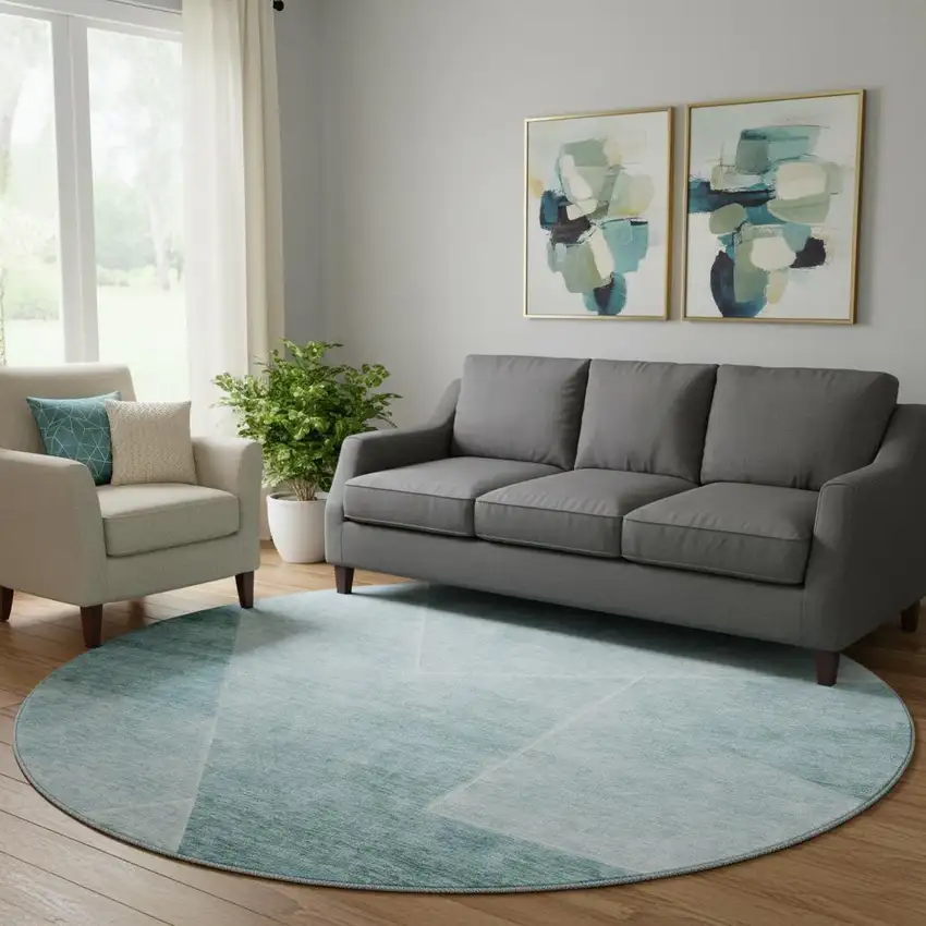 8' Teal And Ivory Geometric Washable Round Rug With UV Protection Photo 1