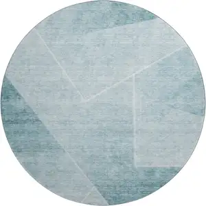 Photo of 8' Teal And Ivory Geometric Washable Round Rug With UV Protection