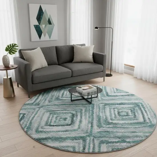 8' Teal And Ivory Geometric Washable Round Rug With UV Protection Photo 2