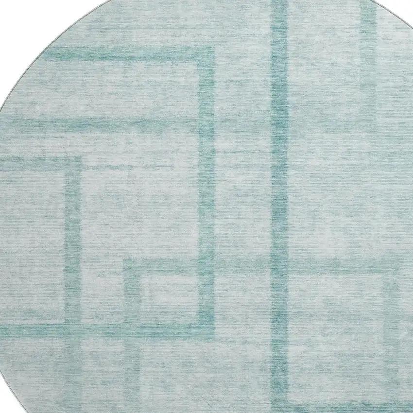 8' Teal And Ivory Geometric Washable Round Rug With UV Protection Photo 3