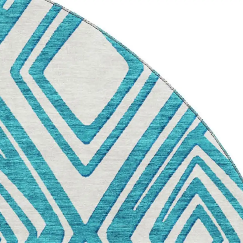 8' Teal And Ivory Geometric Washable Round Rug With UV Protection Photo 4