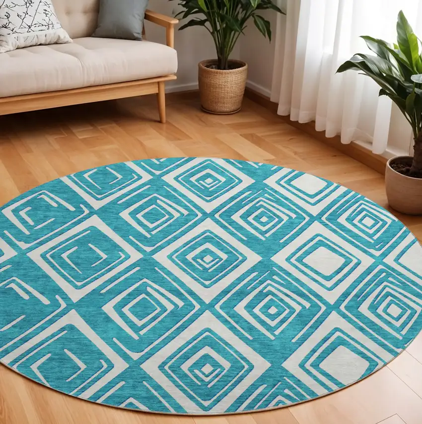 8' Teal And Ivory Geometric Washable Round Rug With UV Protection Photo 1