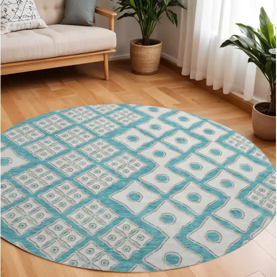 8' Teal And Ivory Geometric Washable Round Rug With UV Protection Photo 1