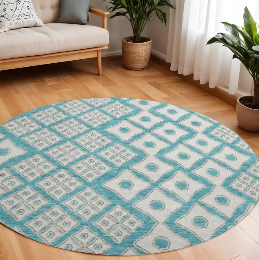 8' Teal And Ivory Geometric Washable Round Rug With UV Protection Photo 1