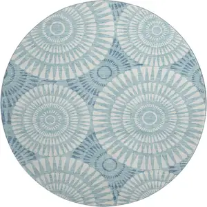 Photo of 8' Teal And Ivory Geometric Washable Round Rug With UV Protection