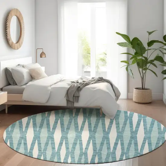8' Teal And Ivory Geometric Washable Round Rug With UV Protection Photo 5