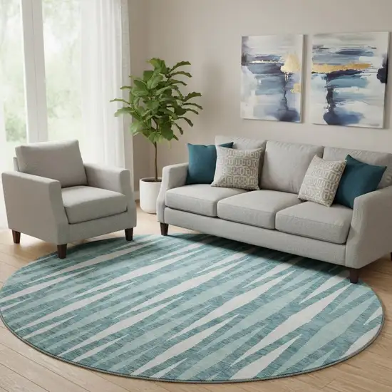 8' Teal And Ivory Geometric Washable Round Rug With UV Protection Photo 1