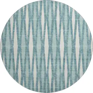 Photo of 8' Teal And Ivory Geometric Washable Round Rug With UV Protection