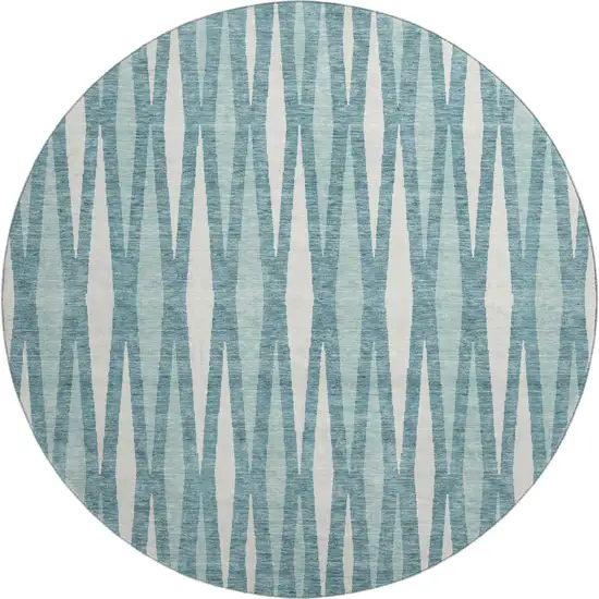 8' Teal And Ivory Geometric Washable Round Rug With UV Protection Photo 1