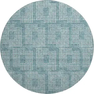 Photo of 8' Teal And Ivory Geometric Washable Round Rug With UV Protection