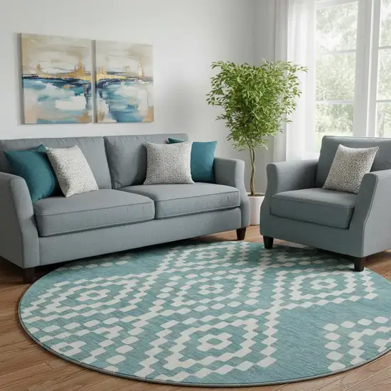 8' Teal And Ivory Geometric Washable Round Rug With UV Protection Photo 1