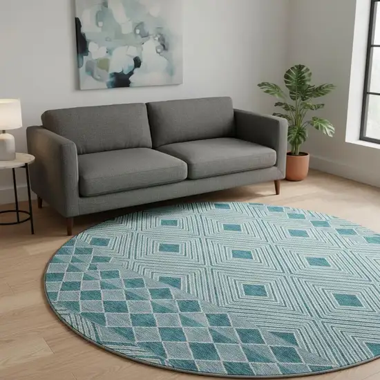 8' Teal And Ivory Geometric Washable Round Rug With UV Protection Photo 2