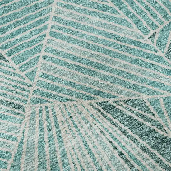 8' Teal And Ivory Geometric Washable Round Rug With UV Protection Photo 9