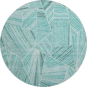 Photo of 8' Teal And Ivory Geometric Washable Round Rug With UV Protection