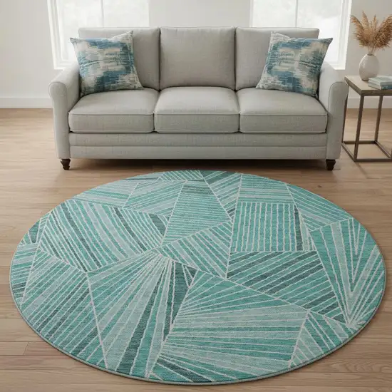 8' Teal And Ivory Geometric Washable Round Rug With UV Protection Photo 2