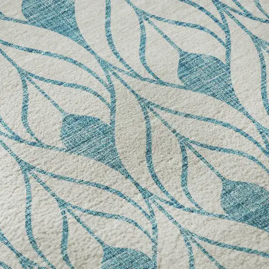 8' Teal And Ivory Geometric Washable Round Rug With UV Protection Photo 8