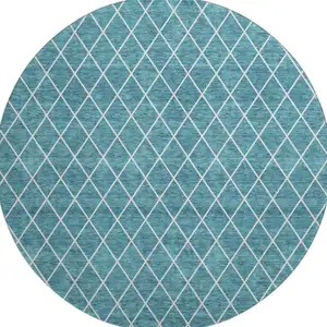 Photo of 8' Teal And Ivory Geometric Washable Round Rug With UV Protection
