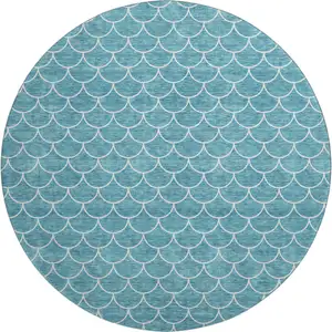 Photo of 8' Teal And Ivory Geometric Washable Round Rug With UV Protection