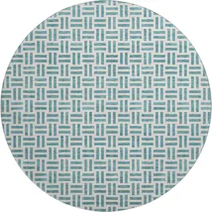 Photo of 8' Teal And Ivory Geometric Washable Round Rug With UV Protection