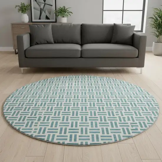 8' Teal And Ivory Geometric Washable Round Rug With UV Protection Photo 2