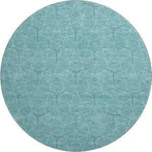 Photo of 8' Teal And Ivory Geometric Washable Round Rug With UV Protection