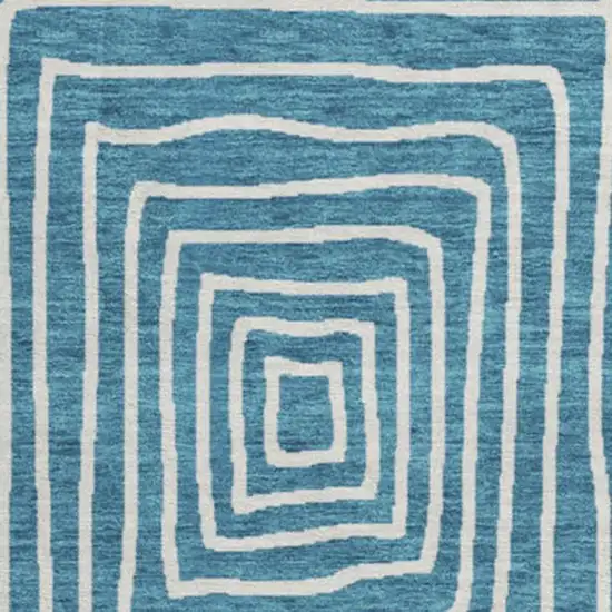 8' Teal And Ivory Geometric Washable Round Rug With UV Protection Photo 2