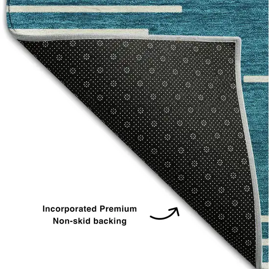 8' Teal And Ivory Geometric Washable Round Rug With UV Protection Photo 5