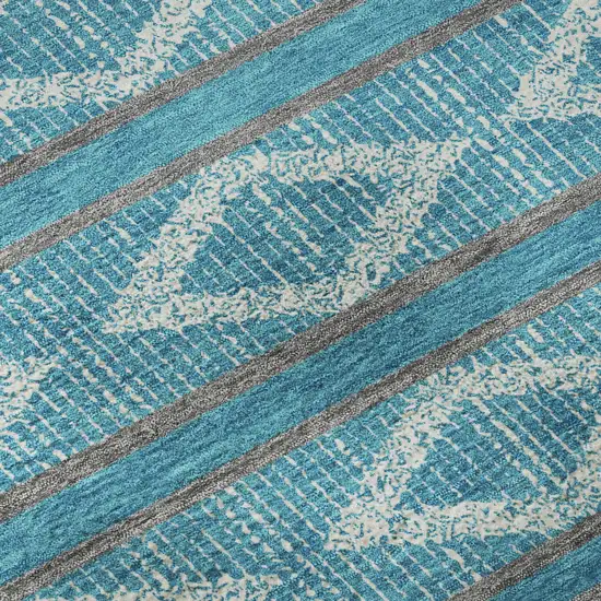 8' Teal And Ivory Geometric Washable Round Rug With UV Protection Photo 8