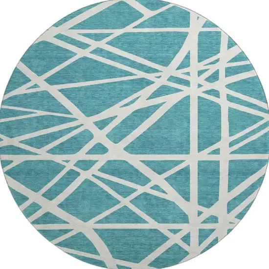 8' Teal And Ivory Geometric Washable Round Rug With UV Protection Photo 2