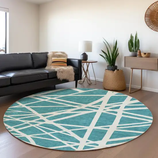 8' Teal And Ivory Geometric Washable Round Rug With UV Protection Photo 4