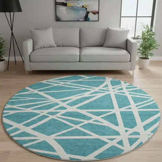 8' Teal And Ivory Geometric Washable Round Rug With UV Protection Photo 2