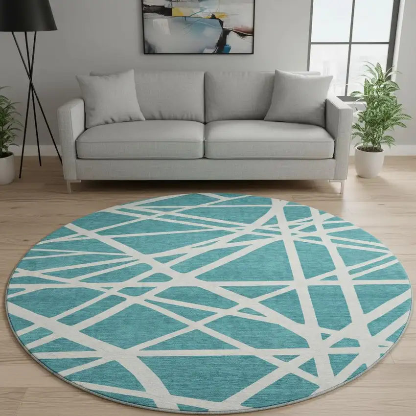 8' Teal And Ivory Geometric Washable Round Rug With UV Protection Photo 2
