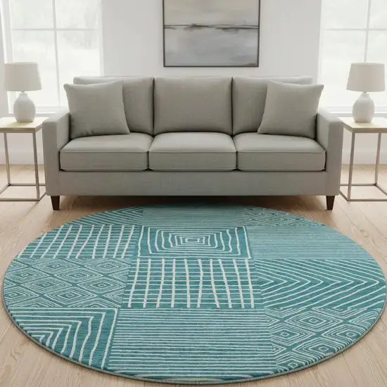 8' Teal And Ivory Geometric Washable Round Rug With UV Protection Photo 2