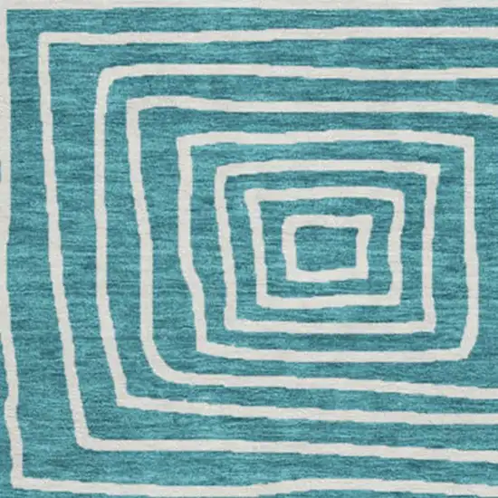 8' Teal And Ivory Geometric Washable Round Rug With UV Protection Photo 3