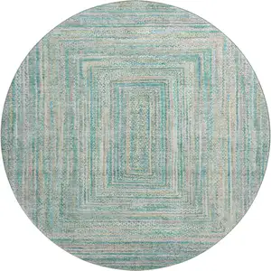 Photo of 8' Teal And Ivory Geometric Washable Round Rug With UV Protection