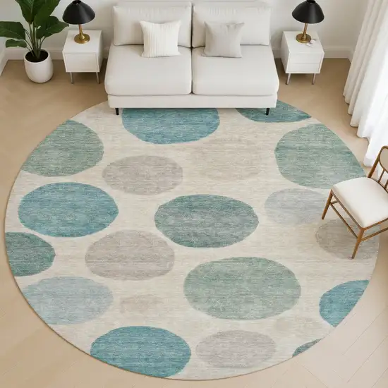 8' Teal And Ivory Geometric Washable Round Rug With UV Protection Photo 5